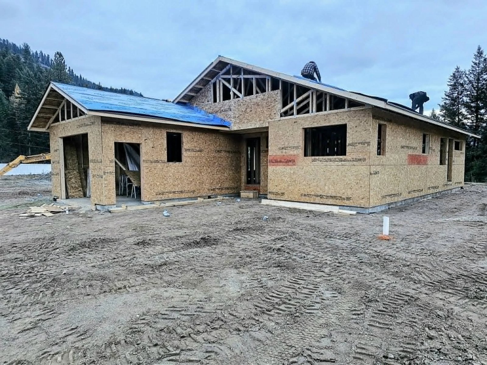 Custom home construction in the West Kootenays — Sheathing & roof